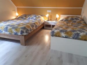 Ένα ή περισσότερα κρεβάτια σε δωμάτιο στο “In Oans Oefje” Parel in de polder!