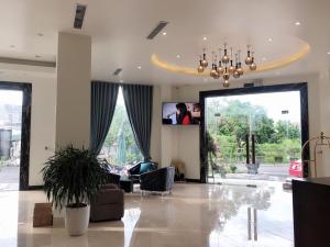 Lobbyn eller receptionsområdet på Lotus Hotel & Apartment