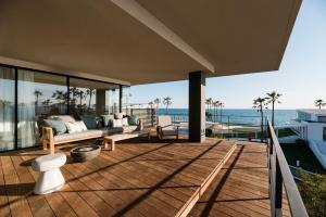 Balkón nebo terasa v ubytování MALIBU HOTEL