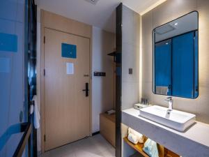 Vonios kambarys apgyvendinimo įstaigoje LanOu Hotel Lanzhou Zhengning Road Night Market