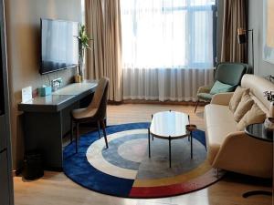 Posezení v ubytování LanOu Hotel Linyi Lanling Agricultural Park