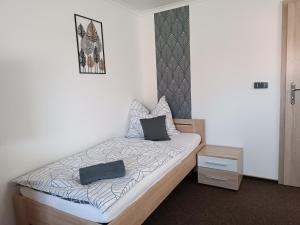 Posteľ alebo postele v izbe v ubytovaní Penzion Kolonka