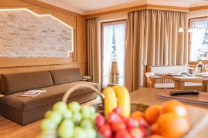 Predel za sedenje v nastanitvi Hotel Garni Apart TINA