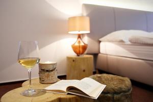 Postel nebo postele na pokoji v ubytování Hotel & Garden U Holubů
