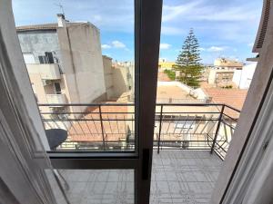 a view from a window of a balcony at Piso con balcón La Alberca, Murcia in Murcia