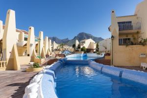 The swimming pool at or close to Home2Book Dream Apartment Blue Coast Sun Fañabé