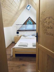 Postel nebo postele na pokoji v ubytování Osada na Klinku