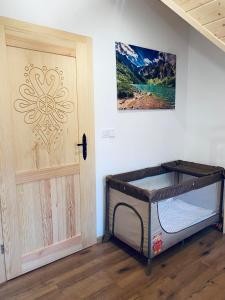 Postel nebo postele na pokoji v ubytování Osada na Klinku