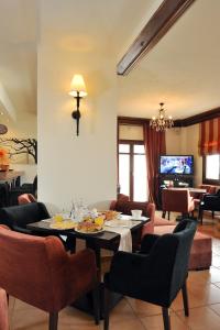 TV a/nebo společenská místnost v ubytování Guesthouse Kapaniaris