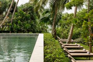 a pool at the resort at Kurulu Bay in Ahangama