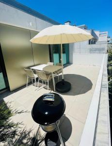 Patio nebo venkovní prostory v ubytování CL Afonso Cordeiro Apartment
