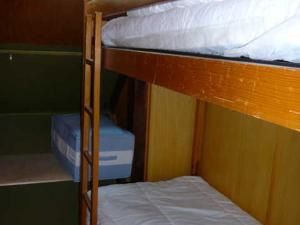 a couple of bunk beds in a room at Chalet Corrençon-en-Vercors, 2 pièces, 6 personnes - FR-1-515-55 in Corrençon-en-Vercors
