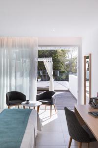 A seating area at Petit Sagitario Adults only