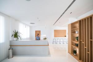 A bed or beds in a room at Petit Sagitario Adults only