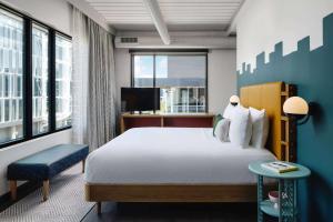 Postel nebo postele na pokoji v ubytování Origin Austin, a Wyndham Hotel + 37 fotografií