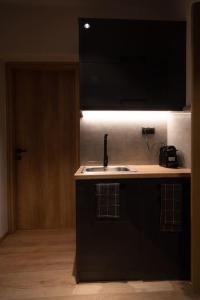 A kitchen or kitchenette at #G32 Luxury residence in the centre of Volos