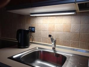 Kuchyňa alebo kuchynka v ubytovaní Larix Cervinia apartment Vda Vacanze in Vetta - CIR 0322
