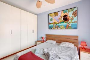 Łóżko lub łóżka w pokoju w obiekcie Tenerife Zen