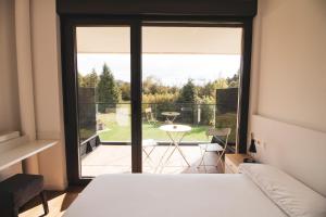 Postel nebo postele na pokoji v ubytování agroturismo Araize