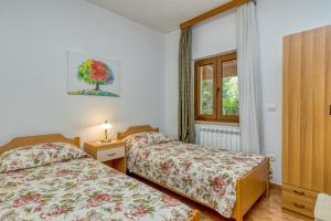 Postel nebo postele na pokoji v ubytování Haus Diana
