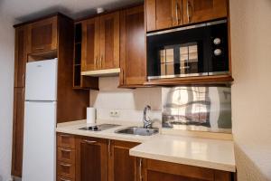 A kitchen or kitchenette at Lazcano Málaga by DV Properties