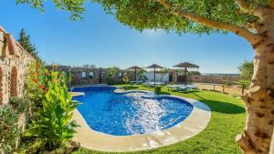 The swimming pool at or close to Apto El Descanso II Conil de la Frontera by Ruralidays