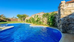 The swimming pool at or close to Apto El Descanso II Conil de la Frontera by Ruralidays