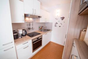Kuchyňa alebo kuchynka v ubytovaní Appartement Zentrum