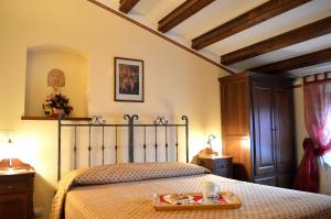 A bed or beds in a room at Il Castello