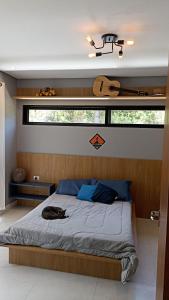 Postel nebo postele na pokoji v ubytování Casa Aracuã