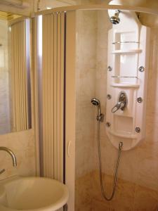 Koupelna v ubytování Hotel Segas