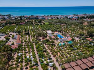 an aerial view of a resort with a pool at Camping Cambrils Caban in Cambrils