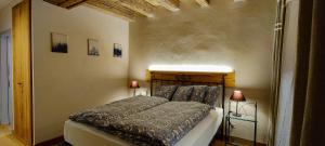 Postel nebo postele na pokoji v ubytování Hôtel St-Georges Romont