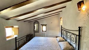 a bedroom with a bed in a room at 8 bedrooms villa with private pool furnished garden and wifi at Taberno in Taberno