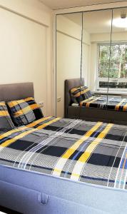 Cama o camas de una habitación en Luksusowy Apartament Nad Zalewem