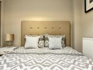 Posteľ alebo postele v izbe v ubytovaní LuxApart Kalisz Loft