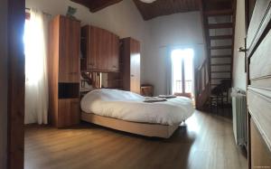 Posteľ alebo postele v izbe v ubytovaní Villa spacieuse à Ax-les-Thermes avec piscine et spa + 19 fotografií