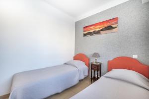 Posteľ alebo postele v izbe v ubytovaní Appartement cosy à Cannes - 40 m² avec balcon et vue mer