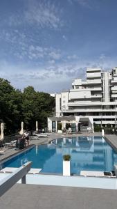 Bazén v ubytování DOMUS Grand Hotel nebo v jeho okolí