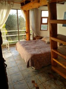 Postel nebo postele na pokoji v ubytování Casa Cuento