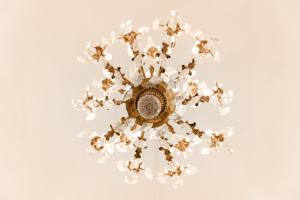 a chandelier hanging from a ceiling at B&B Palazzo Cerami in Catania