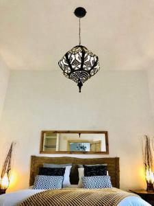 A bed or beds in a room at El Quinto de Luciañez