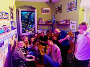 a group of people sitting in a room at Hurricane Hostel in Split