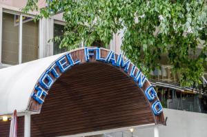 a wooden arch with the word hiya on it at Hotel Flamingo in Lisbon
