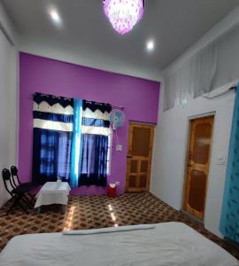 Katil atau katil-katil dalam bilik di Pall Residency