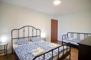 Letto o letti in una camera di Apartmány Zaječák