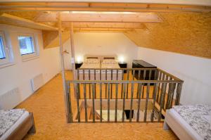 a view of a room with two beds at Apartmány Zaječák in Zaječí