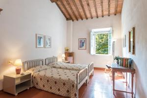 Ένα ή περισσότερα κρεβάτια σε δωμάτιο στο Fattoria Orizzonte +44 φωτογραφίες