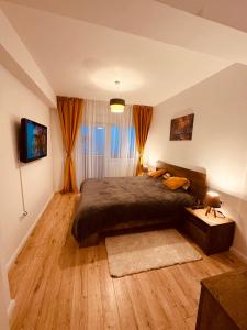 Un pat sau paturi într-o cameră la A&Y APARTAMENT