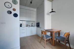 Kuchyň nebo kuchyňský kout v ubytování GO Apartments - ApartHotel